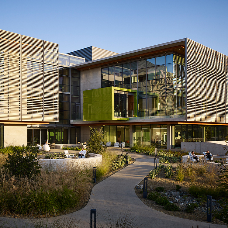 View of west exterior and landscape at dusk