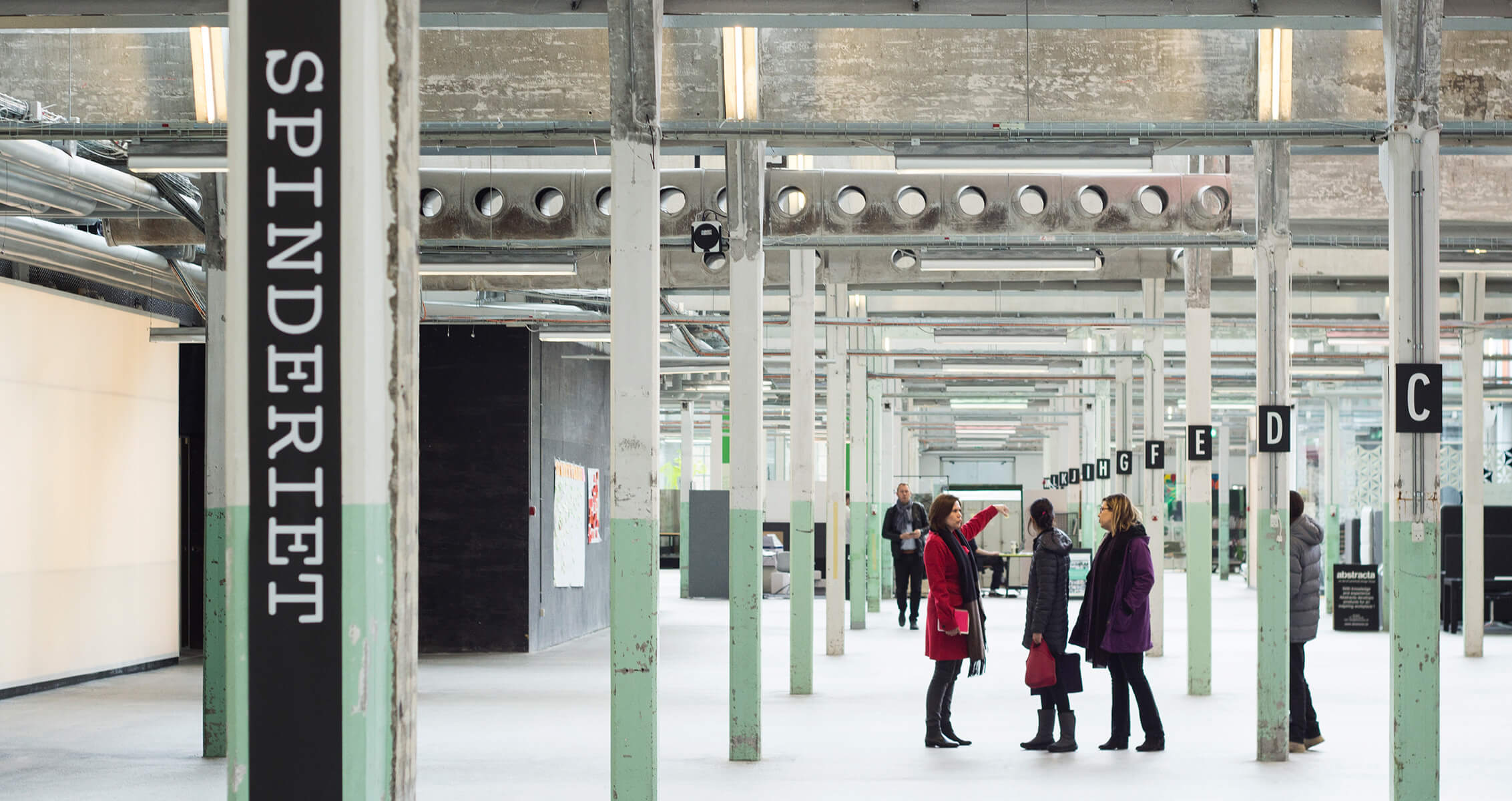 an interior industrial-style space with columns
