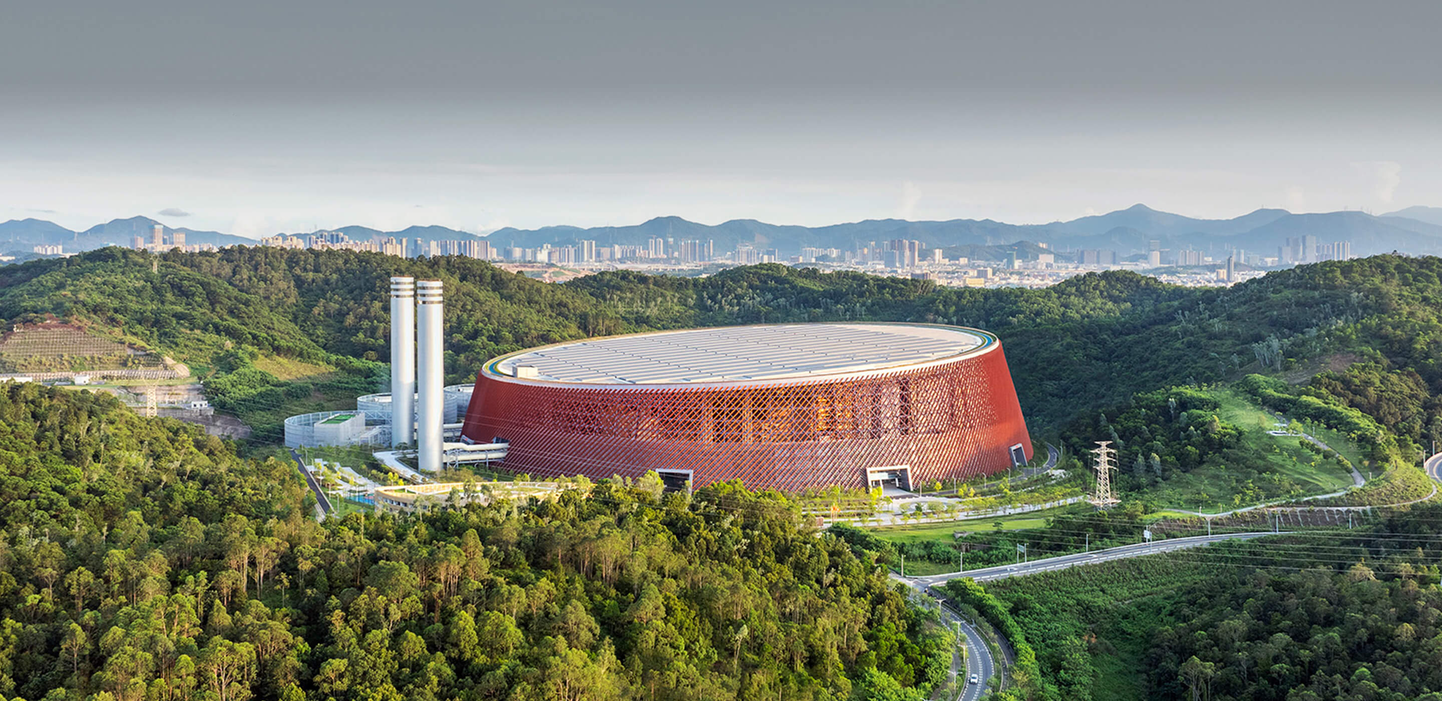 aerial exterior of the energy ring in the mountains above shenzhen