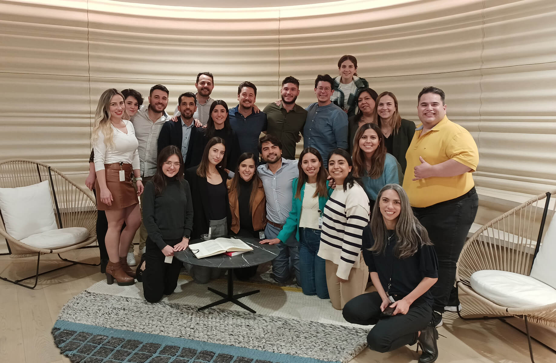 Team photo in the lobby.
