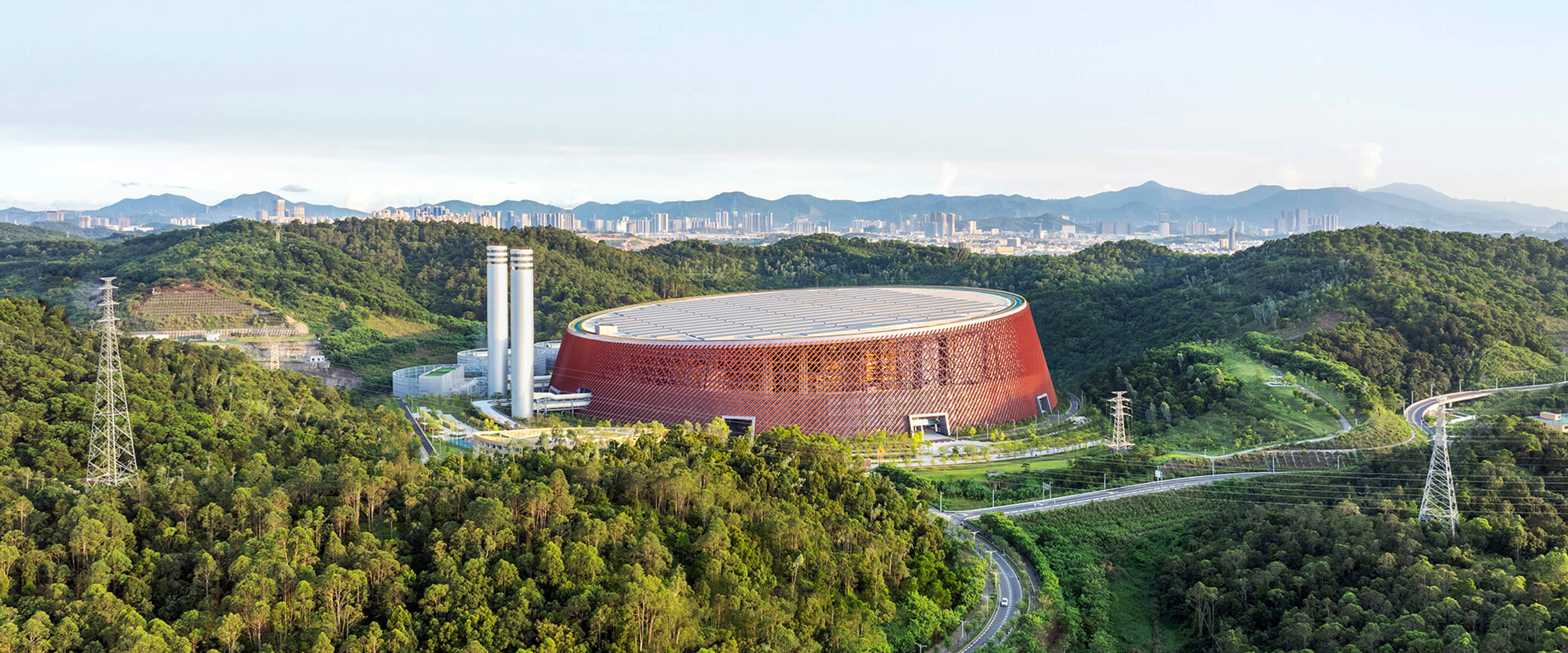 aerial exterior of the energy ring in the mountains above shenzhen